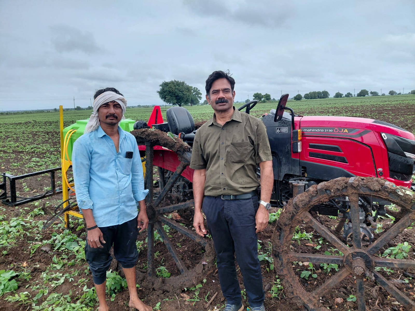 Mahindra OJA tractor with sprayer in the field — Bhaskar Agro Solutions, Hubballi